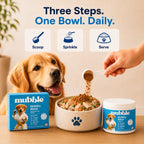 A golden retriever sits beside a bowl of pet food with a human hand sprinkling powder from a scoop. A blue canister labeled 'mubble Mobility Blend' is shown, along with text reading 'Three Steps.